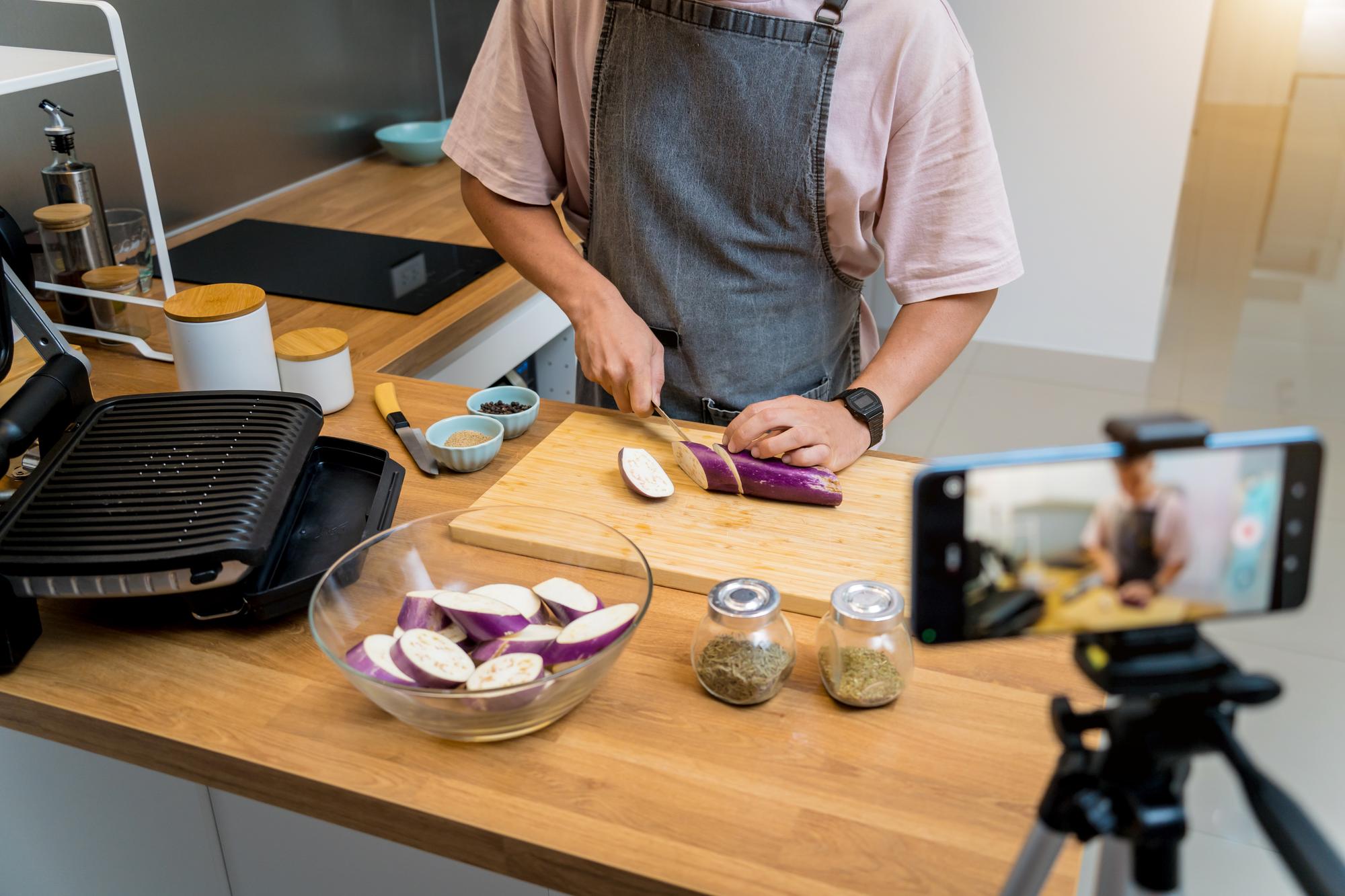 Small studio setup with camera and laptop for cooking class